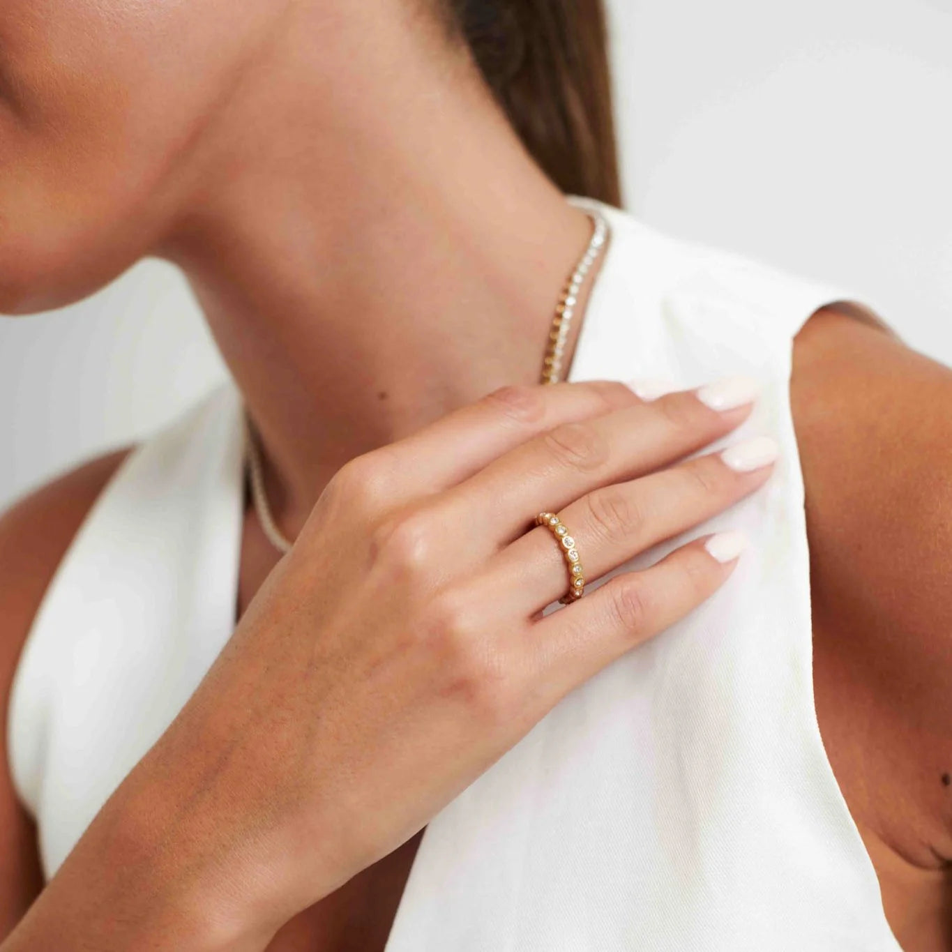 Enqlo | Women's Golden Bezel Tennis Ring